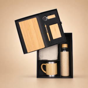 Premium Bamboo Executive Gift Set with notebook, pen, bottle, mug, and keychain. Sustainable corporate gifting solution for clients and employees.